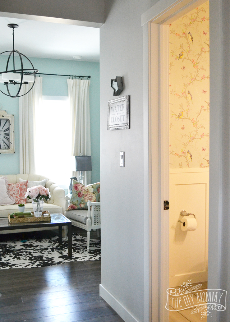 A DIY Powder Room Makeover with Chinoiserie Inspired Bird & Floral Wallpaper and Board and Batten Trim