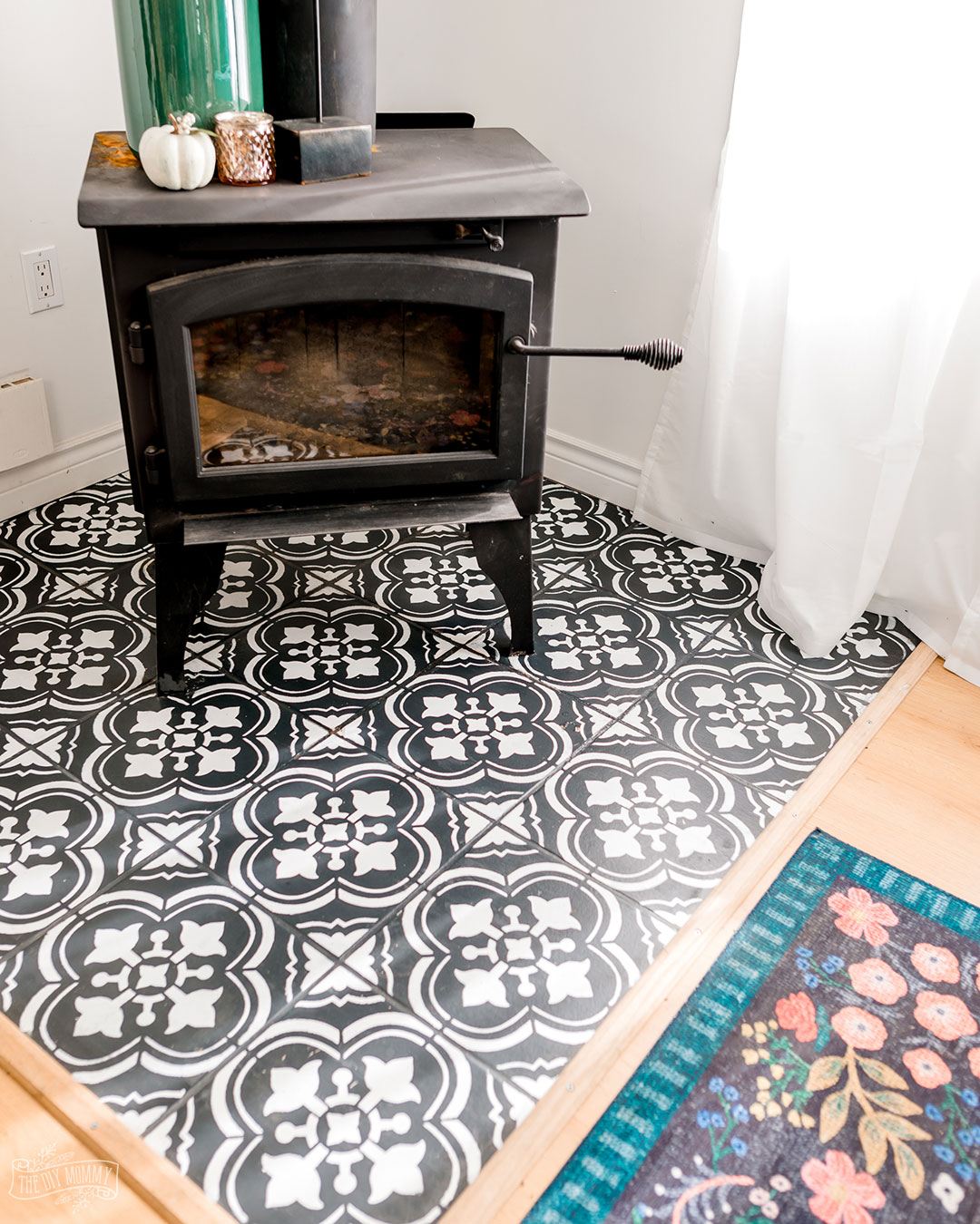 Here's how our painted floor tiles look 2 1/2 years later.