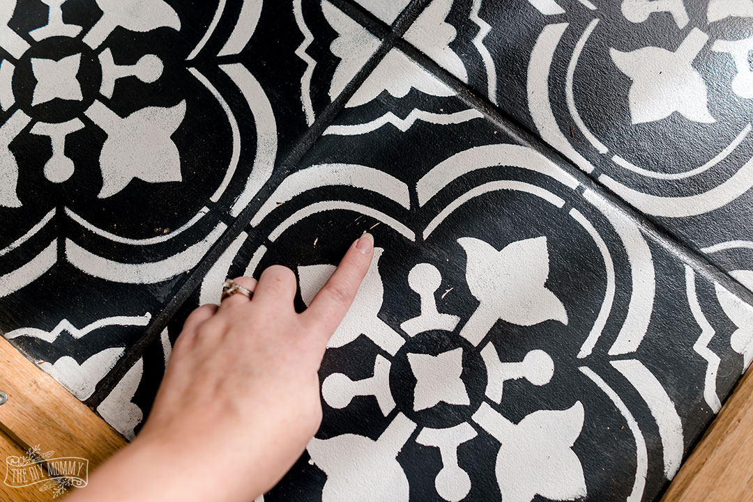 Here's how our painted floor tiles look 2 1/2 years later.